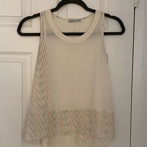 Off white sleeveless blouse